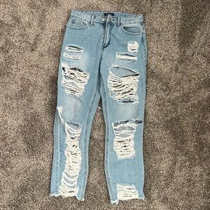 Ripped Jeans with rips on front and back, size 8 or 29” waist